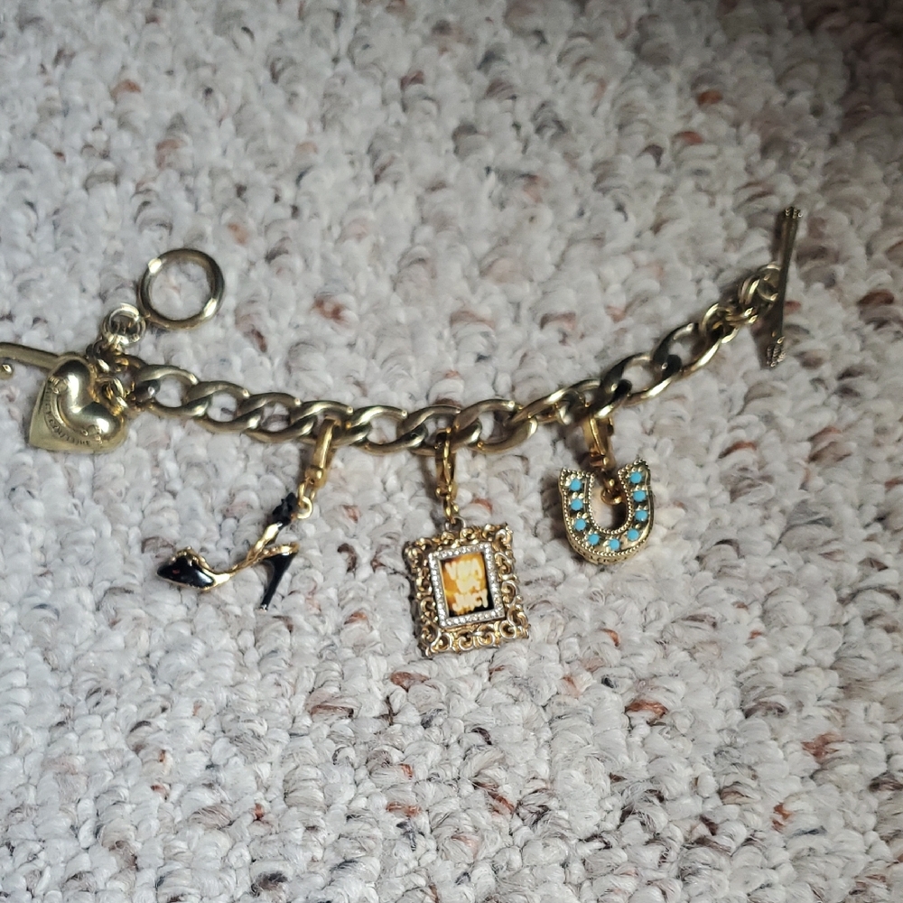 Gold Charm Bracelet with Black and Blue Accents